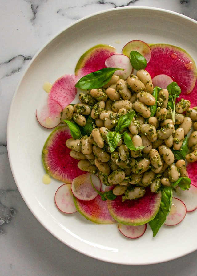 pesto beans on marble background